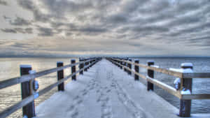 Snowy Pier Winter Skies4 K Wallpaper