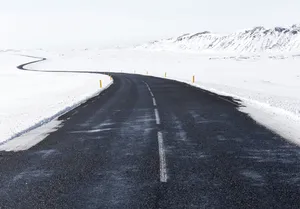 Snowy Rural Road In The Winter Wallpaper