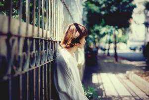 So Sad Woman On Fence Wallpaper