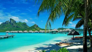 Soak In The Hawaiian Sun At A Beautiful Beach Wallpaper