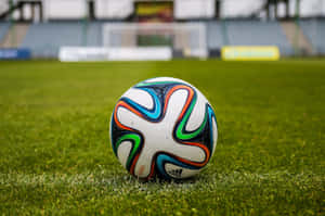 Soccer Ball On Football Field Wallpaper