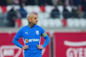 Soccer Player Alexandru Mitrita In Action Wallpaper