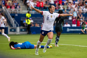 Soccer Player Celebration After Scoring Wallpaper