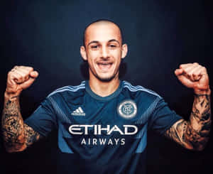 Soccer Player Celebratory Pose Wallpaper