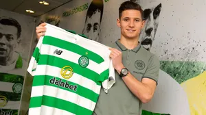 Soccer Player Holding Team Jersey Wallpaper