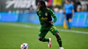 Soccer_ Player_in_ Action_on_ Field Wallpaper