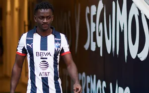 Soccer_ Player_in_ Striped_ Uniform Wallpaper