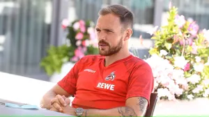 Soccer Player Interview Outdoors Wallpaper