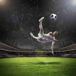 Soccer Player Kicking The Ball Wallpaper