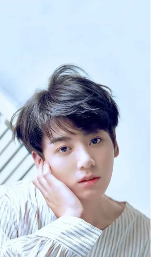 Soft Gaze Portrait Young Man Wallpaper