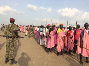 South Sudan Soldier In Vibrant Pink Clothing Wallpaper