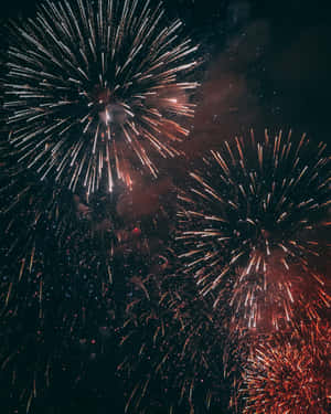 Sparkling Fireworks Display In Sky Wallpaper