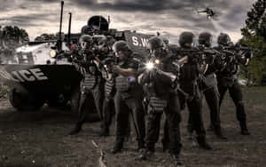 Special Weapons And Tactics (swat) Officers Stand Ready To Keep The Peace Wallpaper