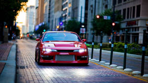 Speed And Style: Red Nissan Silvia S14 Wallpaper