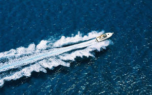 Speed Boat Waves Wallpaper