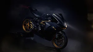 Speeding By The Breathtaking Beauty Of Nature, This Stunning 2560x1440 Motorcycle Photo Will Take Your Breath Away. Wallpaper