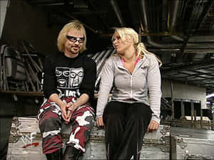 Spike Dudley Sitting Beside Molly Holly Wallpaper