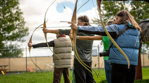 Sport Three Competing Archers Wallpaper