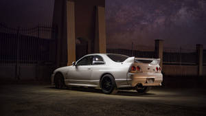 Spotlighted Nissan Skyline Gtr R33 Wallpaper