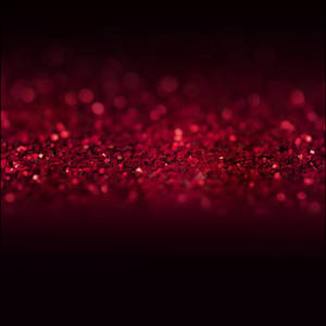 Spruce Up Your Designs With A Splash Of Red Glitters Wallpaper