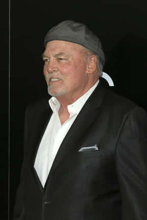 Stacy_ Keach_ Black_ Suit_ Grey_ Cap Wallpaper