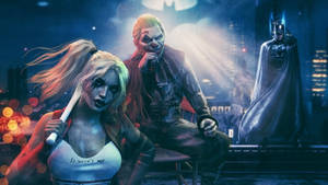 Standing Batman With Joker And Harley Quinn Wallpaper