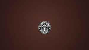 Starbucks Logo On Brown Background Wallpaper