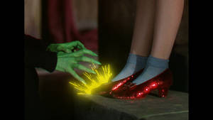 Staring Down The Spellbound Slippers - The Wizard Of Oz Wallpaper