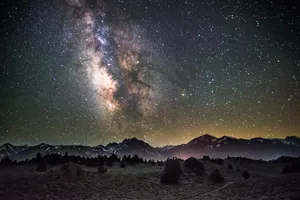 Starry Night Over Mountains Wallpaper