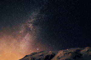 Starry Night Snowy Mountain Peak Wallpaper