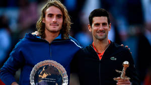 Stefanos Tsitsipas With Novak Djokovic Wallpaper