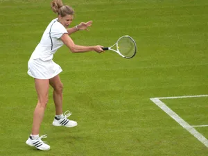 Steffi Graf In Action On The Tennis Court Wallpaper