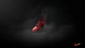 Stellar Red Nike Sneakers In Action Wallpaper