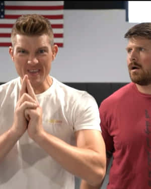 Stephen Thompson Delivering A Dynamic Kick During A Match Wallpaper