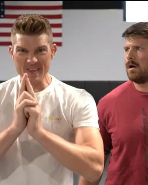 Stephen Thompson Delivering A Dynamic Kick During A Match Wallpaper