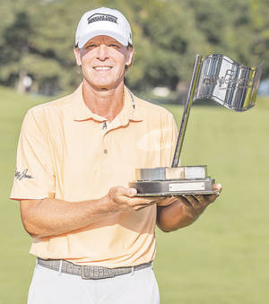Steve Stricker With A Flag Trophy Wallpaper