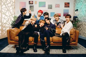 Stray Kids Group Photoon Couch Wallpaper