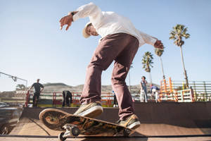 Street Art: Nike Shoes And A Skateboard Wallpaper