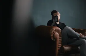 Stress Man Alone In A Room Wallpaper