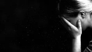 Struggling With Emotional Stress: A Woman In Despair Wallpaper