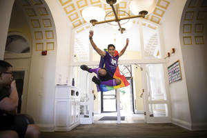 Student Jumping At Carnegie Mellon University Wallpaper