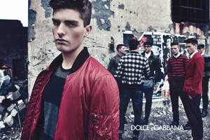 Stunning Models In Dolce And Gabbana's Signature Red And Black Attire Wallpaper