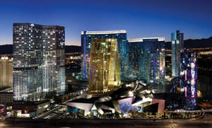 Stunning Nighttime View Of Las Vegas City Center Wallpaper