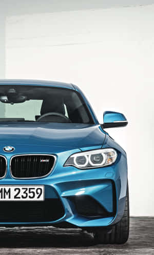 Stylish Bmw Iphone Wallpaper With Elegant Sports Car And Logo Wallpaper