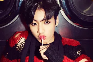 Stylish Portraitwith Lollipop Wallpaper