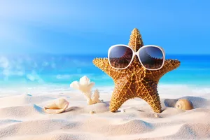 Stylish Sunglasses Reflecting A Beautiful Sunset Wallpaper