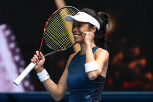 Su-wei Hsieh With Her Fist Up Wallpaper