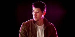 Suave Nick Of Jonas Brothers Wallpaper