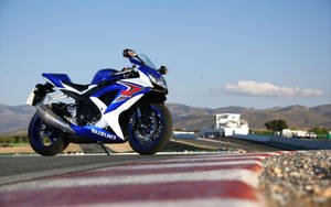 Suave Suzuki Gsx R Sports Motor Bike Wallpaper