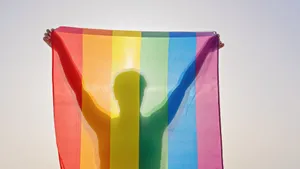 Subtle Lgbt Silhouette Raising Flag Wallpaper